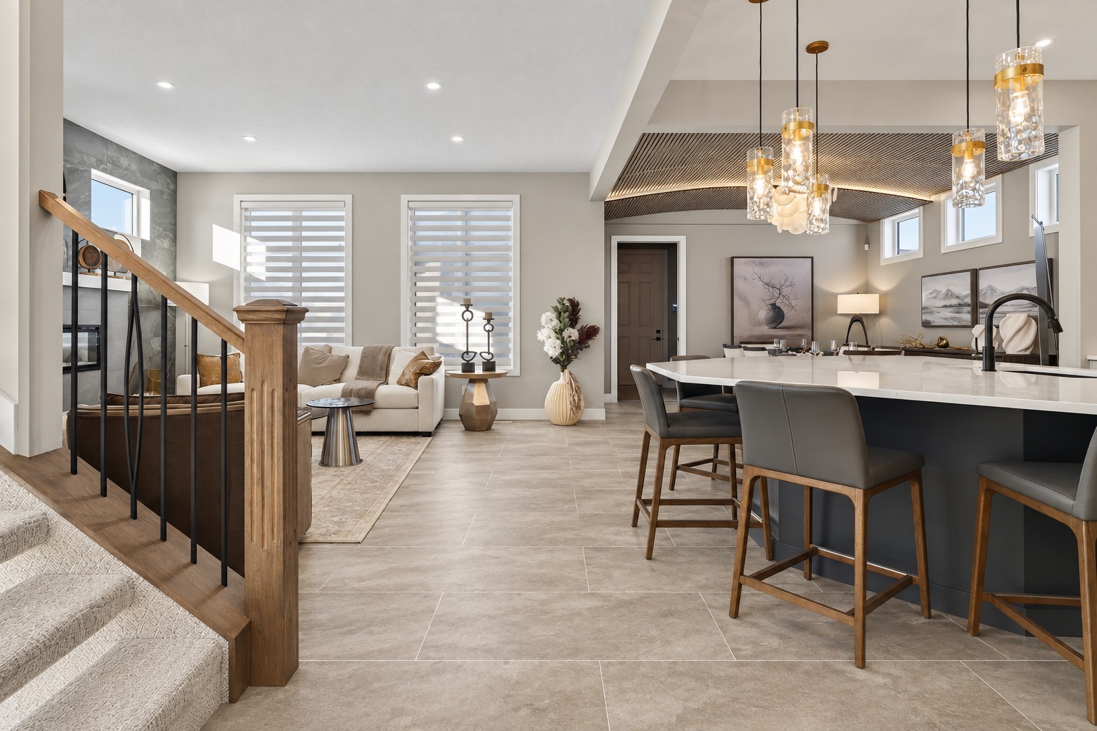 Modern open plan kitchen and living area with stone look LVT flooring